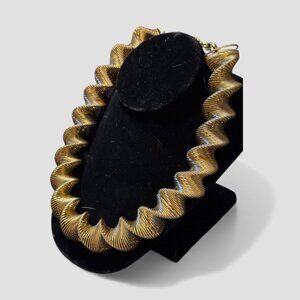 1970s Vintage Gold Tone Slinky Twist Omega Necklace